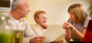 Older couple receiving advice and counseling